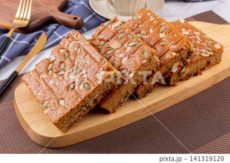 sliced jujube brown sugar cake topped with mixed nuts and seeds sliced jujube brown sugar cake topped with mixed nuts and seeds 141319120