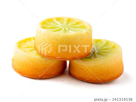 mini lime sponge cake with vibrant green citrus topping mini lime sponge cake with vibrant green citrus topping 141319136