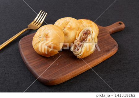 traditional Suzhou style flaky mooncake filled with aromatic rose paste 141319162