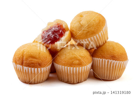freshly baked mini sponge cake with sweet red strawberry jam core freshly baked mini sponge cake with sweet red strawberry jam core 141319180