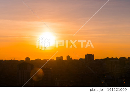 Dramatic sunset sky with the setting sun over the city, Istanbul Dramatic sunset sky with the setting sun over the city, Istanbul 141321009