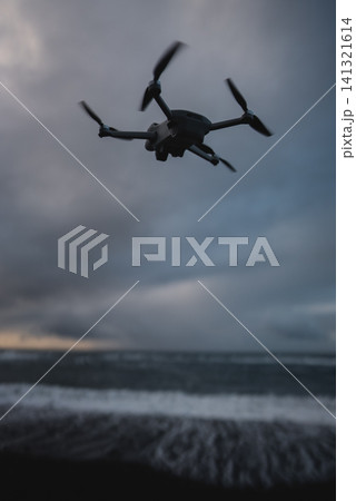 small professional photography and video drone fly over sea small professional photography and video drone fly over sea 141321614