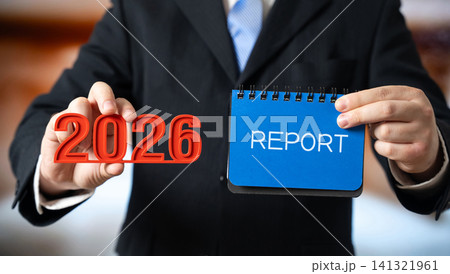 2026 year report concept. Financial reporting of the company. Profit and revenue. Business and finance concept. Businessman and notes in hand 141321961
