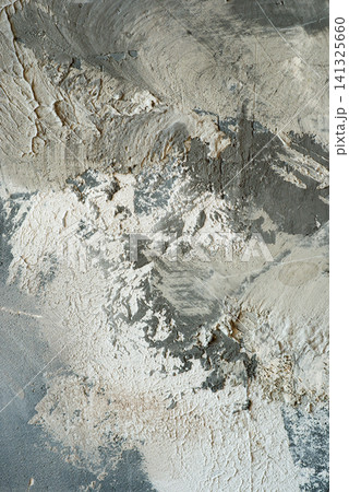 Abstract vertical grunge background with rough grey concrete and white decorative plaster wall texture. 141325660