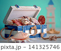Starfish and shells in a wooden box. Nautical decor. 141325746