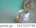 White cappuccino coffee cup with seashells, nautical style 141325748