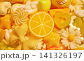 沢山の黄色のデコパーツ　オレンジ　おしゃれでかわいい背景写真　壁紙　デコレーション 141326197