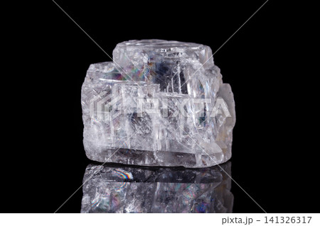 Macro mineral stone Iceland spar on black background Macro mineral stone Iceland spar on black background 141326317