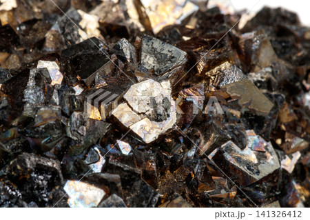 Macro mineral stone Arsenopyrite on a white background Macro mineral stone Arsenopyrite on a white background 141326412