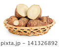 Jerusalem artichoke in a wicker basket isolated on white background 141326892