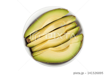 avocado pieces in ceramic bowl isolated on white background close up. Top view. Flat lay avocado pieces in ceramic bowl isolated on white background close up. Top view. Flat lay 141326895