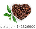 Coffee beans in ceramic bowl isolated on a white background. Top view 141326900