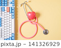 Keyboard with stethoscope on color background,Health care. 141326929