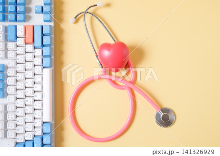 Keyboard with stethoscope on color background,Health care. 141326929