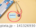 Keyboard with stethoscope on color background,Health care. 141326930