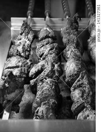 A ruddy kebab is being grilled on a barbecue 141327361