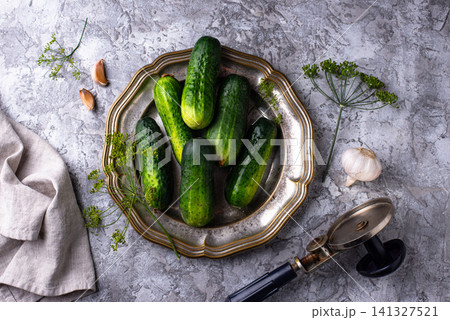 Preparation of marinated salty pickled cucumbers 141327521