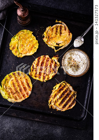 Grilled o cabbage steaks, vegan food Grilled o cabbage steaks, vegan food 141327573