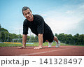 athletic sportsman has workout and planking outdoor 141328497
