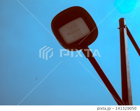 the old red blood pressure monitor on a white background 141329050