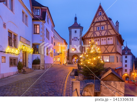 Christmas tree and historic street in Rothenburg ob der Tauber, Bavaria, Germany at dusk 141330638