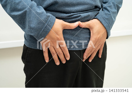 Hernia, Asian man stomach ache, abdominal pain and urology problem health. Hernia, Asian man stomach ache, abdominal pain and urology problem health. 141333541
