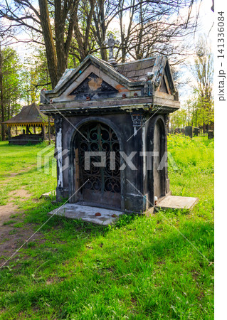 Old stone crypt on the ancient cemetery Old stone crypt on the ancient cemetery 141336084