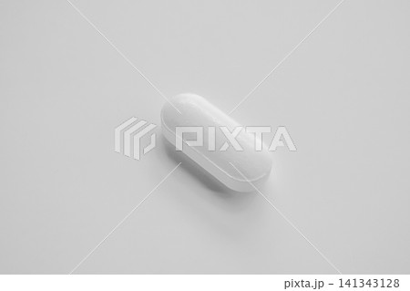 White medicine pill tablet on white background White medicine pill tablet on white background 141343128