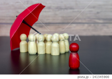 Focus view of leadership figure surrounded by followers under umbrella representing trust, security, and collective protection. Focus view of leadership figure surrounded by followers under umbrella representing trust, security, and collective protection. 141345900