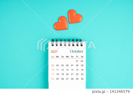 October 2027 desk calendar with red heart on blue color background. 141346579