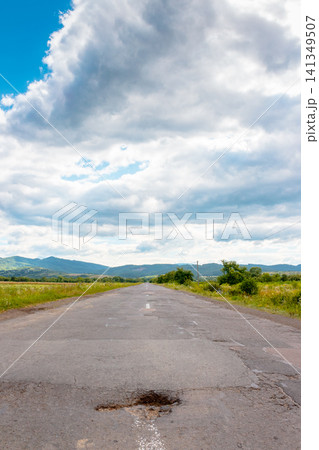 countryside road through carpathian mountains. beautiful summer landscape for ukraine travel background countryside road through carpathian mountains. beautiful summer landscape for ukraine travel background 141349507