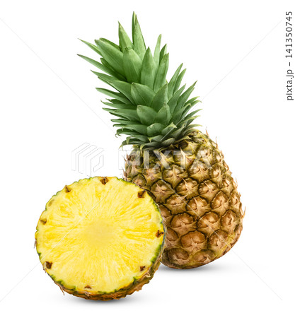 Juicy pineapple and pineapple cut in a slice. Pineapple with leaves isolate on white. Juicy pineapple and pineapple cut in a slice. Pineapple with leaves isolate on white. 141350745