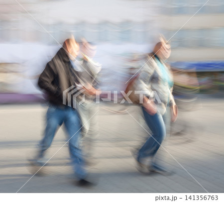 Blurred Pedestrians Walking in Urban Motion Abstract Blurred Pedestrians Walking in Urban Motion Abstract 141356763