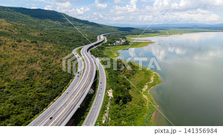 Drone shot The M6 motorway Nakhon Ratchasima Province - Bang Pa-in Lam Ta Khong River and Mountain. Motorway Korat Thailand 141356984