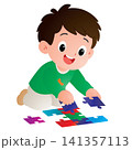 Smart Boy Solving Jigsaw Puzzle 141357113