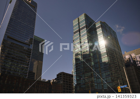 Sun Flare Between Twin Glass Towers Toronto Canada Sun Flare Between Twin Glass Towers Toronto Canada 141359323