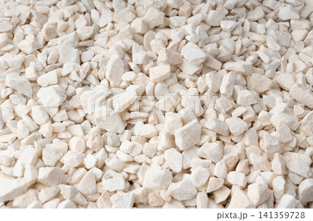 Crushed quartzite pebble textured background, white decorative marble stones close up Crushed quartzite pebble textured background, white decorative marble stones close up 141359728