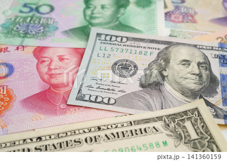 China yuan and dollar banknote money, investment economy business and banking. China yuan and dollar banknote money, investment economy business and banking. 141360159