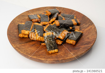 Senbei isolated, kaki no tane rice crackers, japanese crispy snack, sembei, okaki with wasabi, nori Senbei isolated, kaki no tane rice crackers, japanese crispy snack, sembei, okaki with wasabi, nori 141360521