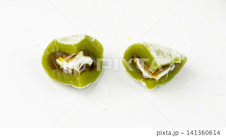 Matcha mochi rice cake, green tea daifuku, Japanese traditional dessert, round wagashi Matcha mochi rice cake, green tea daifuku, Japanese traditional dessert, round wagashi 141360614