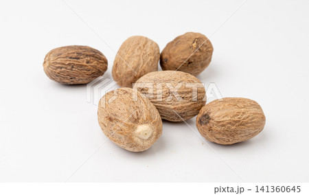 Nutmeg Isolated, Myristica Fragrans Fruit, Dry Spicy Nutmeg Powder, Grated Whole Muscat Nut, Nut Meg 141360645