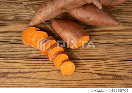 Raw sweet potato, red sweetpotato tubers Raw sweet potato, red sweetpotato tubers 141360701