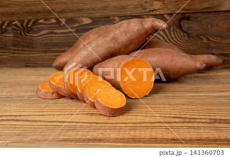 Raw sweet potato, red sweetpotato tubers Raw sweet potato, red sweetpotato tubers 141360703