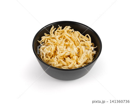 Passatelli spatzle pasta isolated, raw spaetzle noodles, dry homemade german macaroni Passatelli spatzle pasta isolated, raw spaetzle noodles, dry homemade german macaroni 141360736