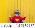 Little boy dressed as a superhero having fun at home 141360939