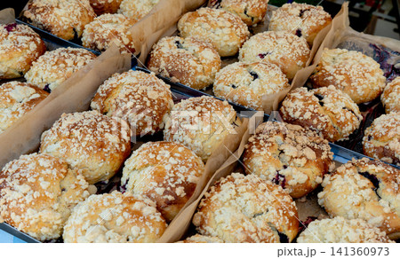 Traditional Polish sweet buns typically filled with wild blueberries 141360973