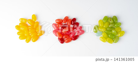 Jelly beans gummy candy pile, colorful marmalade pills Jelly beans gummy candy pile, colorful marmalade pills 141361005