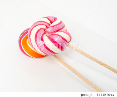Color lollipop, spiral candy on stick, colorful striped lollypop, round fruit caramel, circle lollipop Color lollipop, spiral candy on stick, colorful striped lollypop, round fruit caramel, circle lollipop 141361043