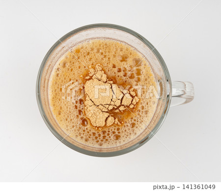 Maca powder drink isolated, dry Peruvian ginseng beverage, powder in water, ground ayak willku tea Maca powder drink isolated, dry Peruvian ginseng beverage, powder in water, ground ayak willku tea 141361049