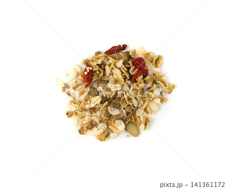 Muesli isolated. Crunchy granola with cereal mix, oat flakes, dry fruits, berries and fiber 141361172